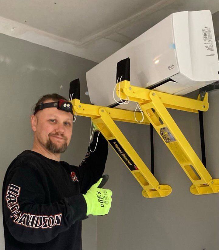 Condo heat pump installation in modern living room – condo heat pump rebates